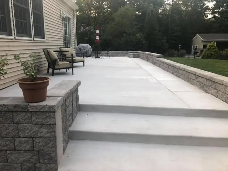 Concrete front walkway by J.D. James Construction